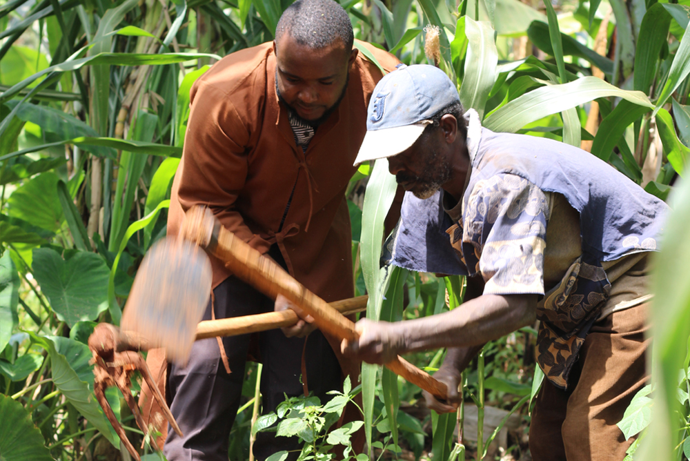 Field Team staff and smallholder farmer